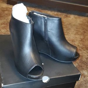 Black booties with zipper